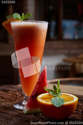 Image of glass watermelon and orange smoothie