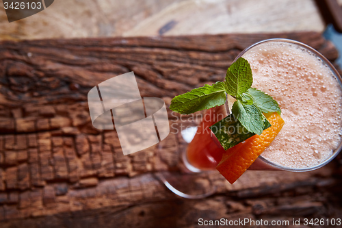 Image of glass watermelon and orange smoothie