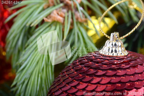Image of Christmas baubles on christmas tree. new year invitation card