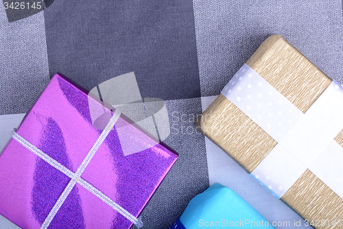 Image of bright gifts with ribbons, holiday invitation card