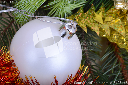 Image of Christmas baubles on christmas tree. new year invitation card