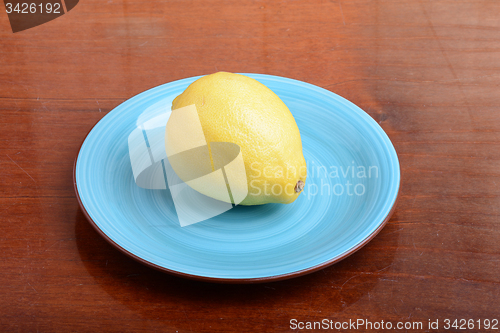 Image of Lemon on blue plate