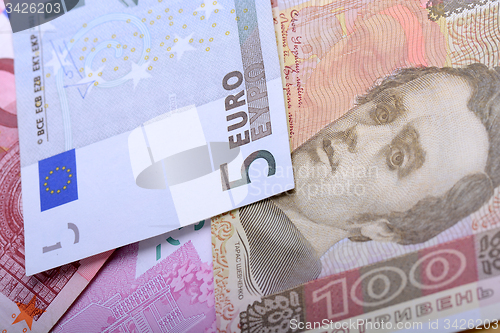 Image of Two currencies - ukrainian grivna and european Euro