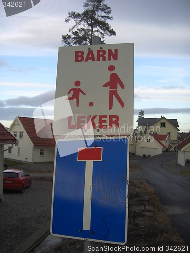 Image of Children plying sign