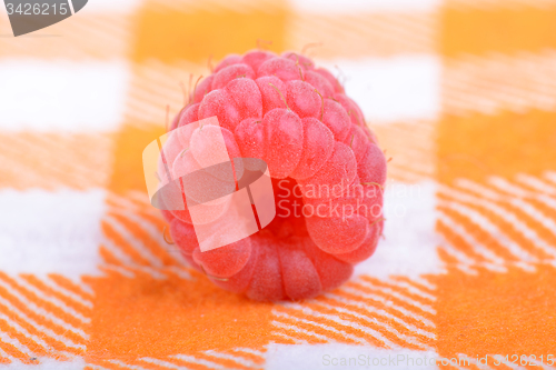 Image of Ripe red raspberries close up