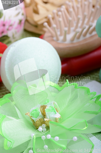 Image of sea salt, comb and flower close up. Relax and treatment therapy. Summer season. 