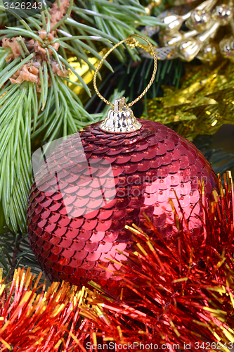 Image of Christmas baubles on christmas tree. new year invitation card