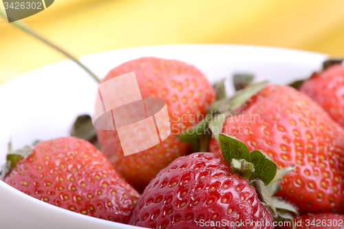 Image of healthy strawberry smoothie with fruits on wooden background