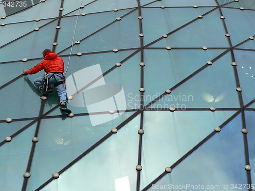 Image of Climber on glass roof