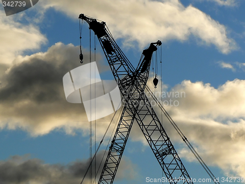 Image of Construction cranes silhouettes