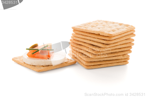 Image of Crackers with cheese and tomato