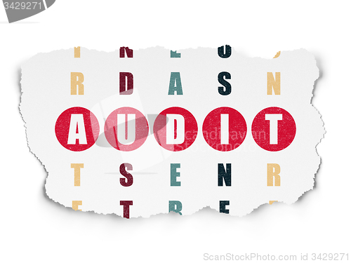 Image of Finance concept: word Audit in solving Crossword Puzzle