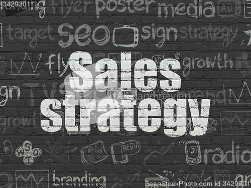 Image of Advertising concept: Sales Strategy on wall background