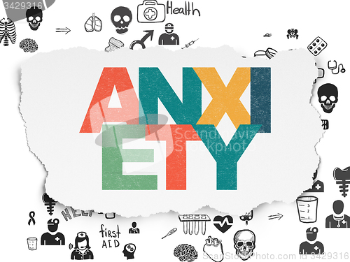 Image of Medicine concept: Anxiety on Torn Paper background