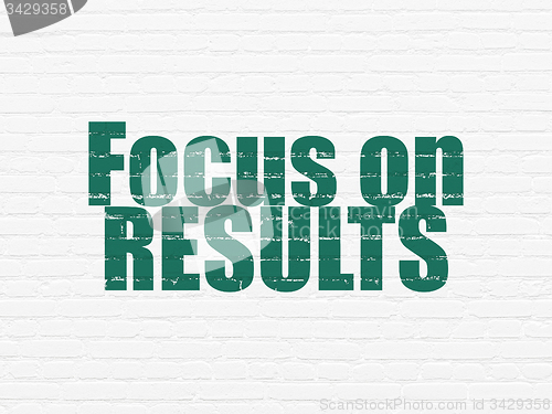 Image of Business concept: Focus on RESULTS on wall background