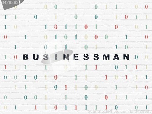 Image of Business concept: Businessman on wall background