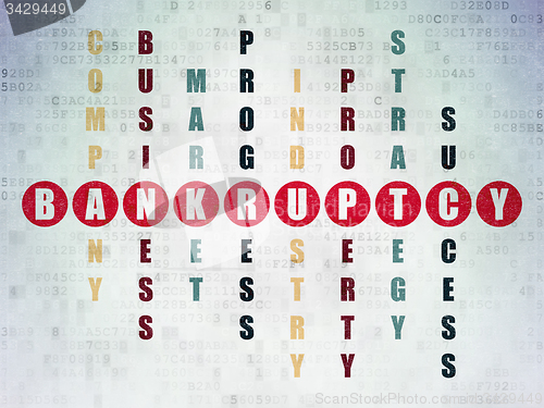 Image of Business concept: word Bankruptcy in solving Crossword Puzzle