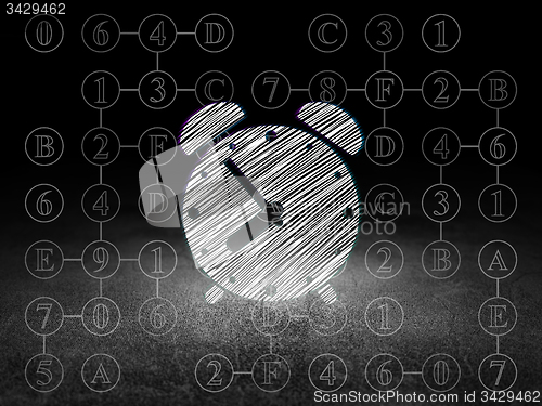 Image of Time concept: Alarm Clock in grunge dark room