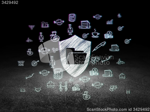 Image of Finance concept: Folder With Shield in grunge dark room