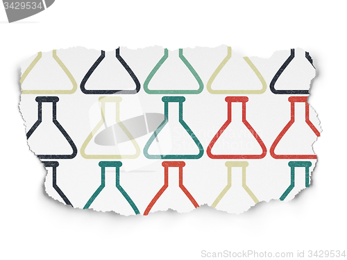 Image of Science concept: Flask icons on Torn Paper background