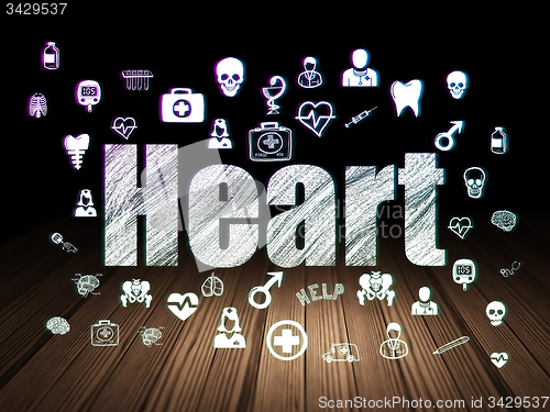 Image of Healthcare concept: Heart in grunge dark room