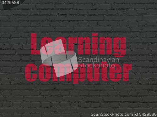 Image of Education concept: Learning Computer on wall background