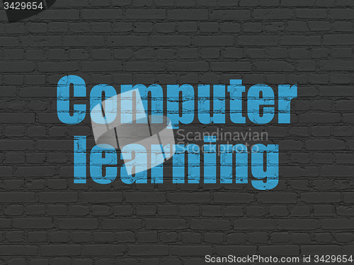 Image of Learning concept: Computer Learning on wall background