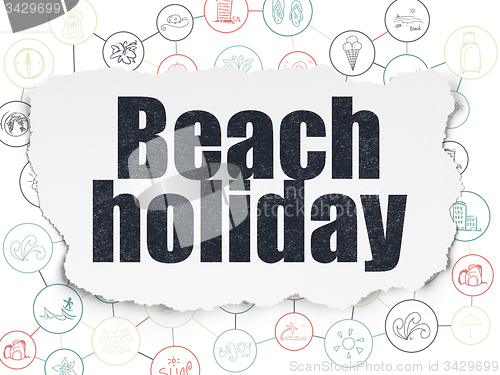 Image of Travel concept: Beach Holiday on Torn Paper background