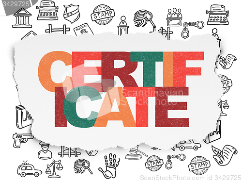 Image of Law concept: Certificate on Torn Paper background