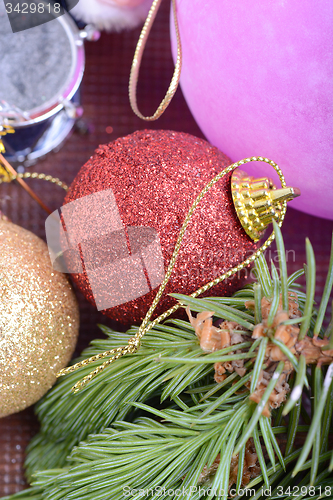 Image of Christmas tree branch with ball