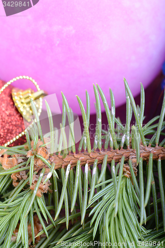 Image of Christmas tree branch with ball