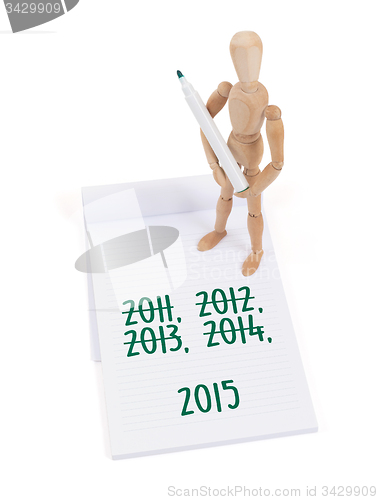 Image of Wooden mannequin writing - 2015