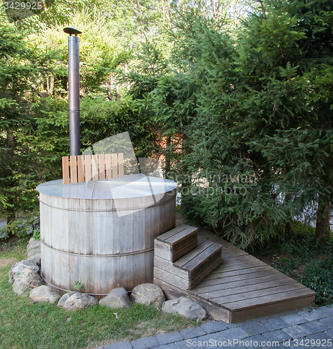 Image of Wooden hot tub in the alps