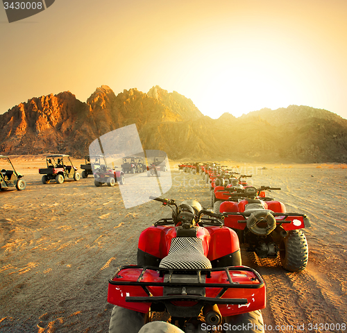 Image of Quad bikes in desert