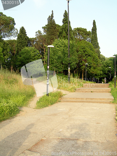 Image of pedestrian walkway  outdoor park with trees gardens in capital c