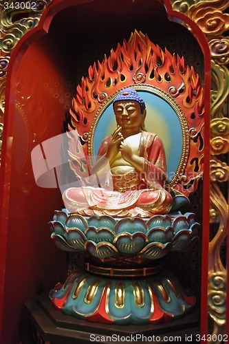 Image of Golden statue of buddha inside a chinese temple