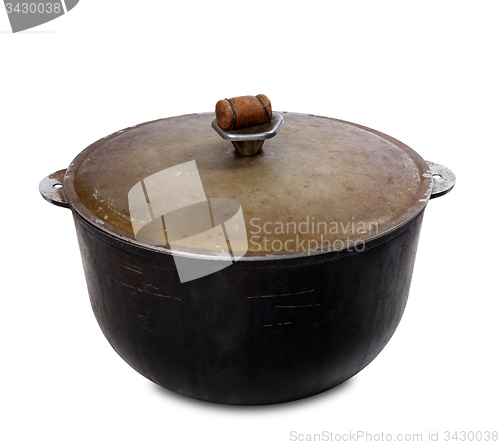 Image of Old black pot on white background 