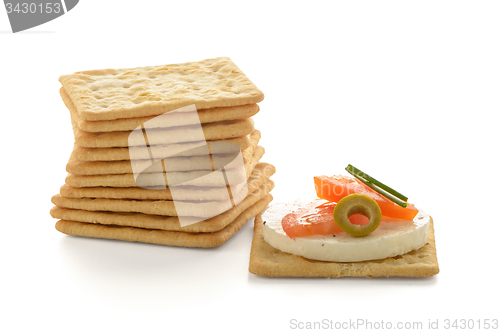 Image of Crackers with cheese and tomato