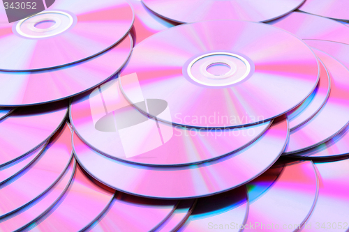 Image of Many pink DVDs or CDs