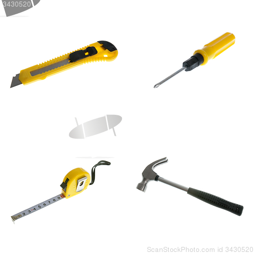 Image of Knife, screw driver, tape and hammer