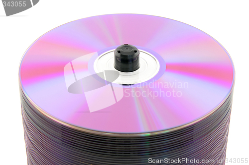 Image of Close-up of purple DVDs on spindle