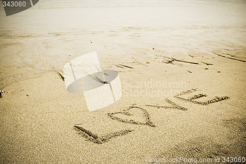 Image of Love sign on the beach