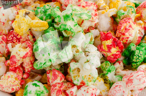 Image of Popped  color kernels of pop corn snack