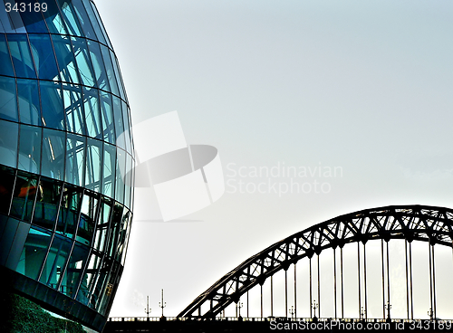 Image of Rounded glass building and Tyne bridge