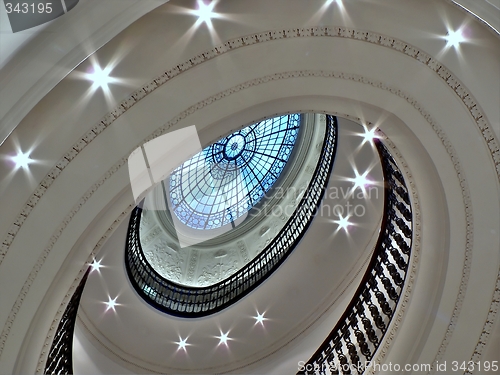 Image of Spiral staircase with glass atrium