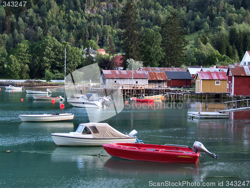 Image of Boats in harbor and calm water