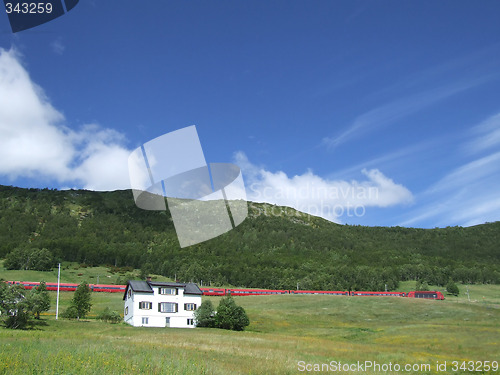 Image of Rural landscape and red train