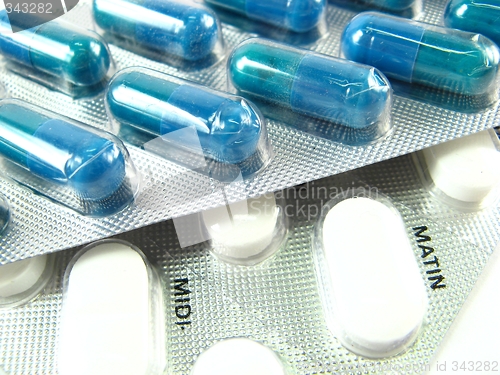 Image of blue and white  pills