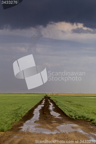 Image of Storm Clouds Saskatchewan wet road