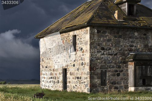 Image of Storm Clouds Prairie Sky Stone House